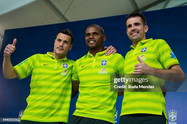 Goalkeepers Julio Cesar, Jefferson and Victor of the Brazilian football team pose for photo during a news conference at the squad's Granja Comary...