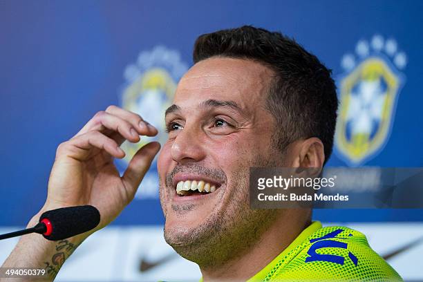 Goalkeeper Julio Cesar of the Brazilian football team attends a news conference at the squad's Granja Comary training complex, in Teresopolis, 90 km...