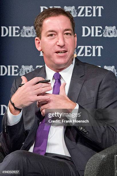 American author, journalist and lawyer Glenn Greenwald speaks during the presentation of his book 'Die globale Ueberwachung' at the Deutsches Theater...