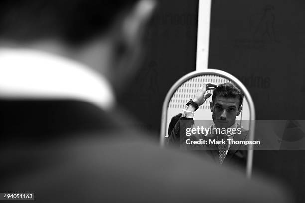 Jules Bianchi of France and Marussia prepares to take part in the Amber Lounge Fashion Show ahead of the Monaco Formula One Grand Prix at Circuit de...