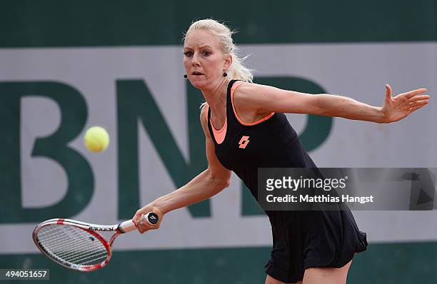 Urszula Radwanska of Poland returns a shot during her women's singles match against Magdalena Rybarikova of Slovakia on day three of the French Open...