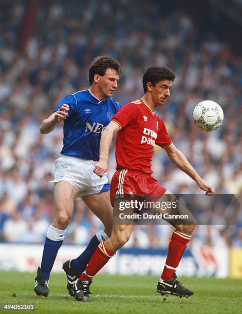 Liverpool player Ian Rush holds off Everton player Dave Watson during the FA Charity Shield match between Everton and Liverpool at Wembley Stadium,...