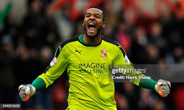 Lawrence Vigouroux of Swindon Town celebrates a last minute equalising penalty for his side scored by Nicky Ajose of Swindon Town during the Sky Bet...