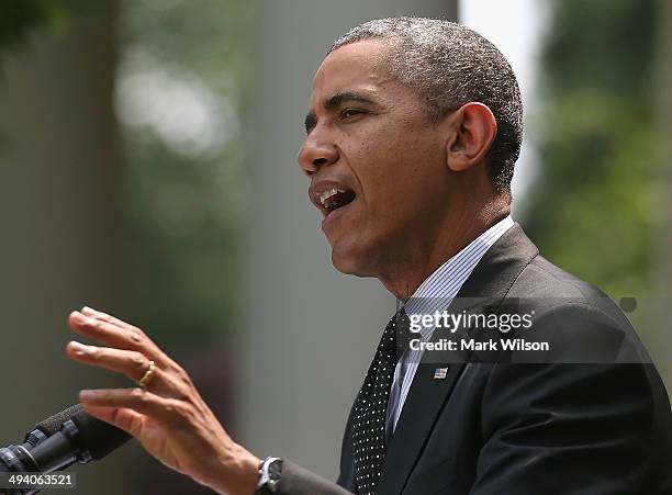 President Barack Obama speaks to the media about removing troops Afghanistan, in the Rose Garden at the White House, May 27, 2014 in Washington, DC....