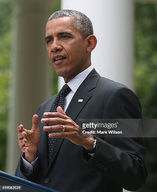 President Barack Obama speaks to the media about removing troops Afghanistan, in the Rose Garden at the White House, May 27, 2014 in Washington, DC....