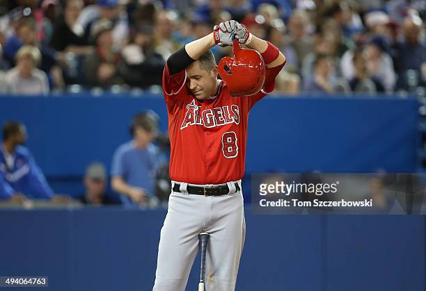John McDonald of the Los Angeles Angels of Anaheim pauses during his at bat in the ninth inning during MLB game action against the Toronto Blue Jays...