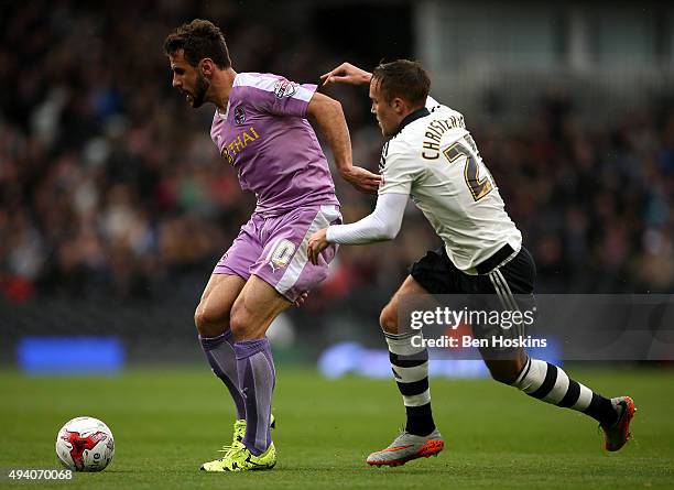 Orlando Sa of Reading holds off pressure from Lasse Vigen Christensen of Fulham during the Sky Bet Championship match between Fulham and Reading on...