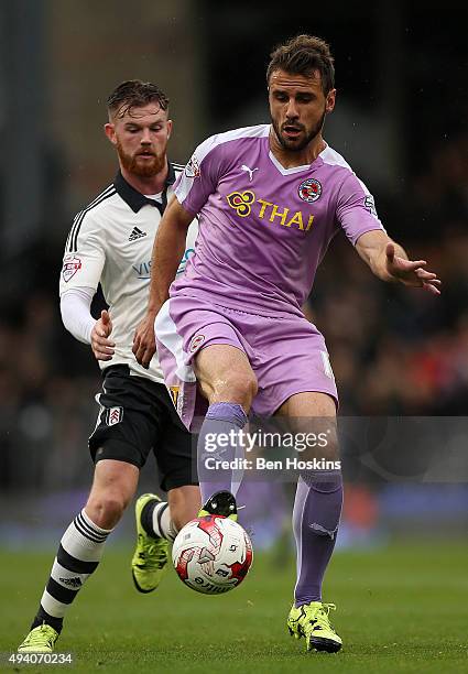 Orlando Sa of Reading advances under pressure from Ryan Tunnicliffe of Fulham during the Sky Bet Championship match between Fulham and Reading on...