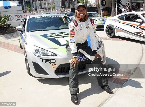 Athlete Carmelita Jeter participates in the 37th Annual Toyota Pro/Celebrity Race - Day 1 held on the streets of Long Beach on April 11, 2014 in Long...