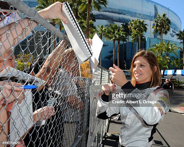 Actress Tricia Helfer participates in the 37th Annual Toyota Pro/Celebrity Race - Day 1 held on the streets of Long Beach on April 11, 2014 in Long...