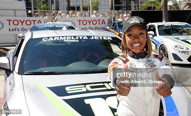 Athlete Carmelita Jeter participates in the 37th Annual Toyota Pro/Celebrity Race - Day 1 held on the streets of Long Beach on April 11, 2014 in Long...