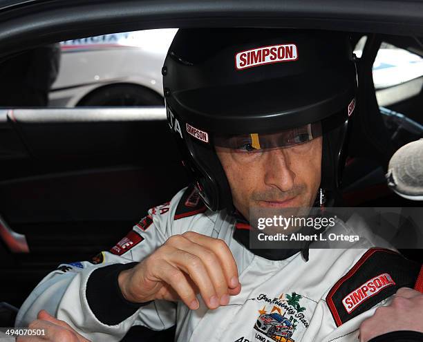 Actor Adrien Brody participates in the 37th Annual Toyota Pro/Celebrity Race - Day 1 held on the streets of Long Beach on April 11, 2014 in Long...