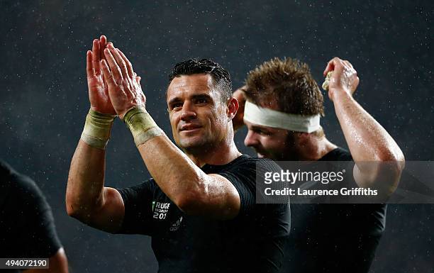 Dan Carter of the New Zealand All Blacks celebrates victory at the end of the match during the 2015 Rugby World Cup Semi Final match between South...
