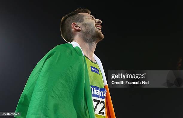 Michael McKillop of Ireland reacts after winning the en's 800m T38 final during the Evening Session on Day Three of the IPC Athletics World...