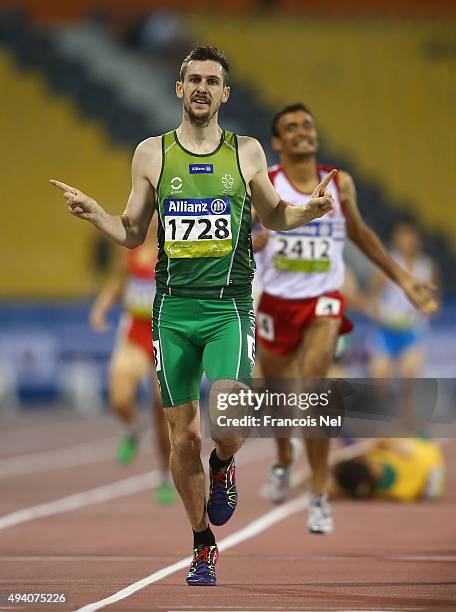 Michael McKillop of Ireland celebrates winning the men's 800m T38 final during the Evening Session on Day Three of the IPC Athletics World...