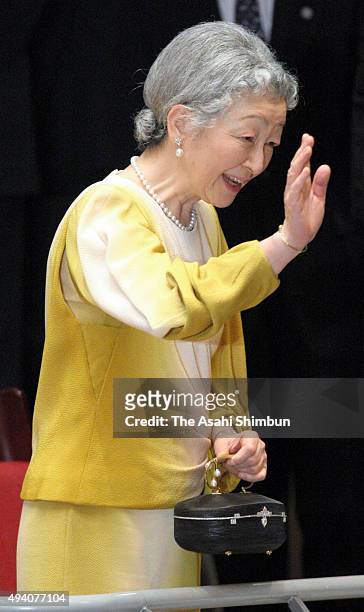 Empress Michiko waves to audience as she attends the charity concert 'Ikiru 2008' on July 15, 2008 in Tokyo, Japan.