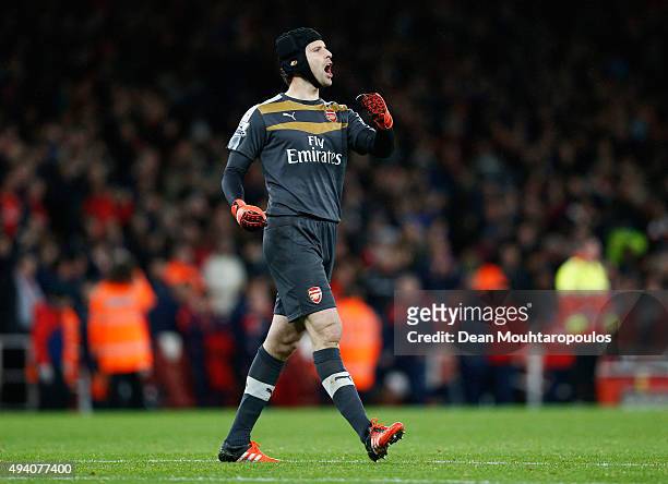 Petr Cech of Arsenal celebrates his team's 2-1 win in the Barclays Premier League match between Arsenal and Everton at Emirates Stadium on October...