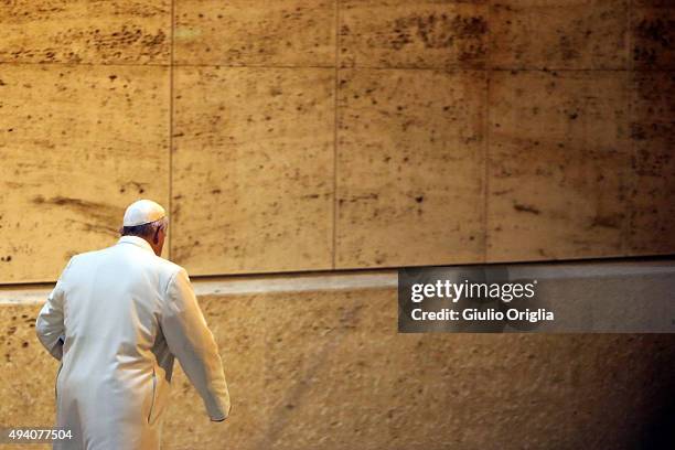 Pope Francis leaves the closing session of the Synod on the themes of family the at Synod Hall on October 24, 2015 in Vatican City, Vatican. The...