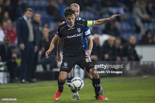 Mark Jan Fledderus of Heracles Almelo, Nathaniel Will of De Graafschap during the Dutch Eredivisie match between De Graafschap and Heracles Almelo at...