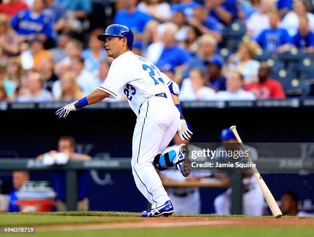 Norichika Aoki of the Kansas City Royals runs up the first base line while watching a fly ball during the 1st inning of the game against the Houston...