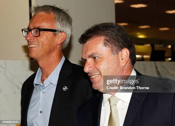 David Gallop and Australian Coach, Ange Postecoglou prepares to depart for Brazil ahead of the 2014 FIFA World Cup, at Sydney International Airport...