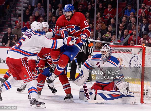Max Pacioretty of the Montreal Canadiens screens Henrik Lundqvist of the New York Rangers during Game Five of the Eastern Conference Final in the...