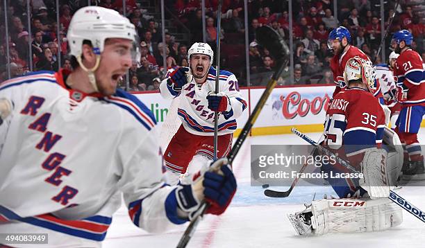 Chris Kreider of the New York Rangers celebrates after scoring a goal on goaltender Dustin Tokarski of the Montreal Canadiens in Game Five of the...