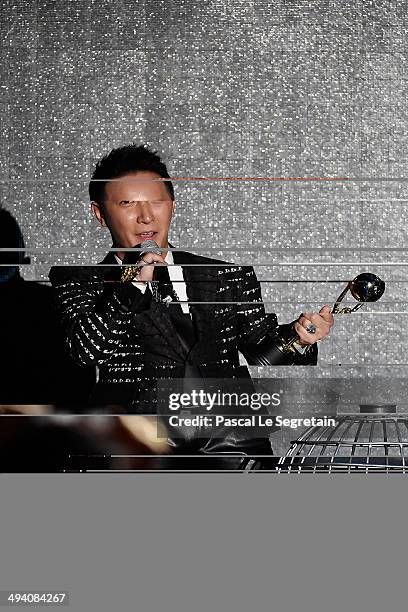 Han Geng receives a award during the ceremony of the World Music Awards 2014 at Sporting Monte-Carlo on May 27, 2014 in Monte-Carlo, Monaco.