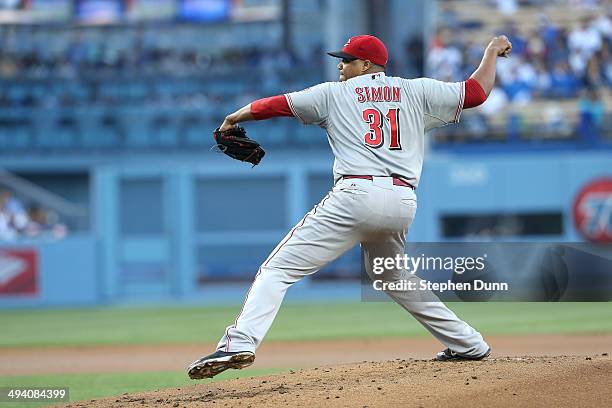 Alfredo Simon of the Cincinnati Reds throws a pitch against the Los Angeles Dodgers at Dodger Stadium on May 27, 2014 in Los Angeles, California.