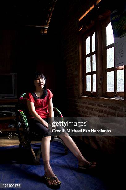 Erwiana Sulistyaningsih poses for a portrait on May 27, 2014 in Ngawi, Indonesia. Erwiana has been voted one of 100 most influential people awarded...