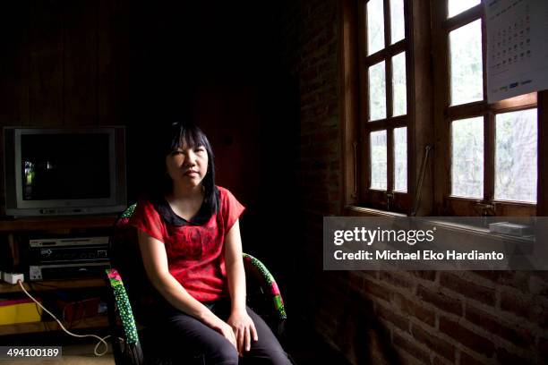 Erwiana Sulistyaningsih poses for a portrait on May 27, 2014 in Ngawi, Indonesia. Erwiana has been voted one of 100 most influential people awarded...