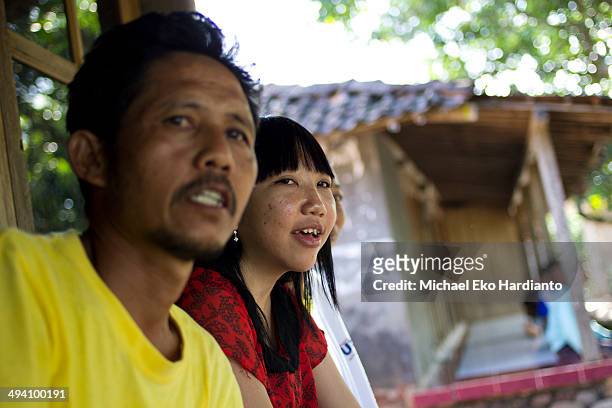 Erwiana Sulistyaningsih shares moment at home with her father, Rohmad Saputro, on May 27, 2014 in Ngawi, Indonesia. Erwiana has been voted one of 100...