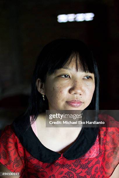 Erwiana Sulistyaningsih poses for a portrait on May 27, 2014 in Ngawi, Indonesia. Erwiana has been voted one of 100 most influential people awarded...