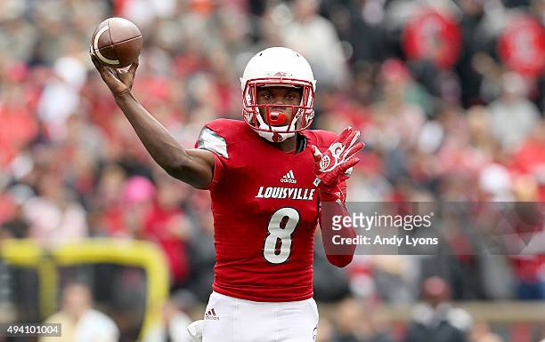 Lamar Jackson of the Louisville Cardinals throws a pass against the Boston College Eagles at Papa John's Cardinal Stadium on October 24, 2015 in...