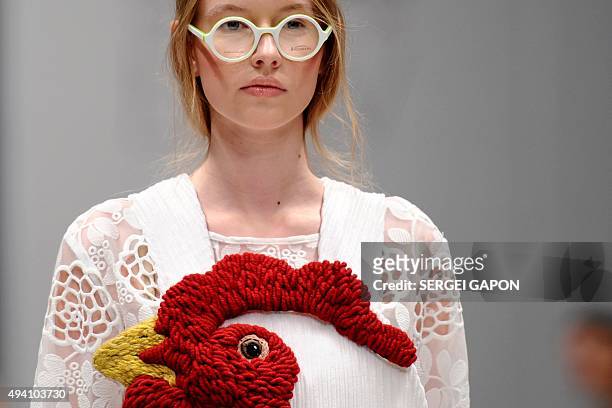 Model presents a creation by Belarusian designer Tanya Tur during Belarus Fashion Week in Minsk on October 24, 2015. AFP PHOTO / SERGEI GAPON