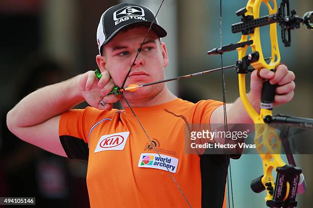 Mike Schloesser of Neatherland shoots during the compound men's individual competition as part of the Mexico City 2015 Archery World Cup Final at...