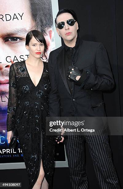 Model/photographer Lindsay Usich and musician Marilyn Manson arrive for the Premiere Of Warner Bros. Pictures And Alcon Entertainment's...