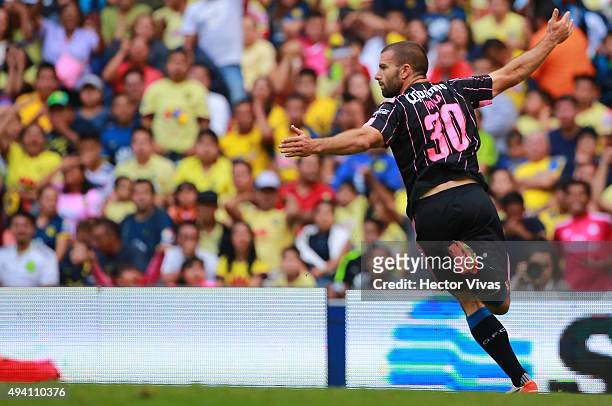 Emanuel Villa of Queretaro celebrates after scoring the first gol of his team during the 14th round match between America and Queretaro as part of...