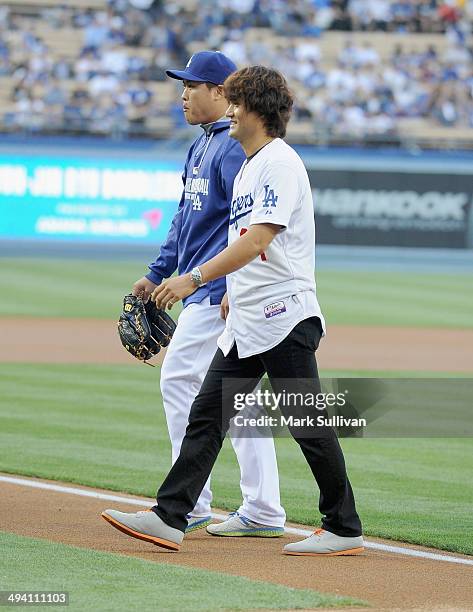 Former Los Angeles Dodger pitcher Chan Ho Park and Los Angeles Dodger pitcher Hyun-Jin Ryu before the game between the Los Angeles Dodgers and...