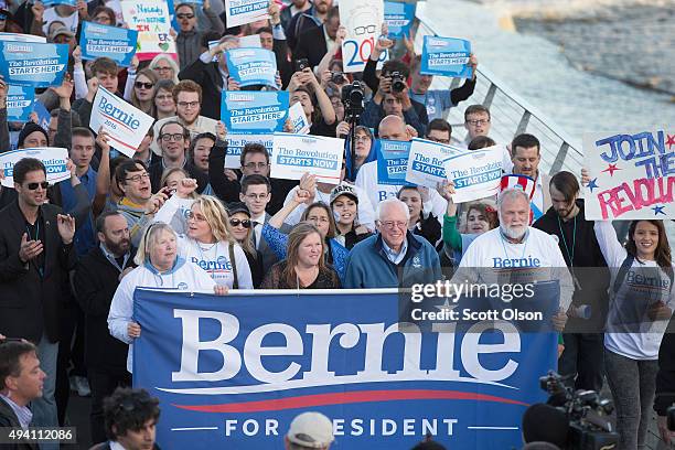Democratic presidential candidate Senator Bernie Sanders leads a march to the Iowa Events Center before the start of the Jefferson-Jackson dinner on...