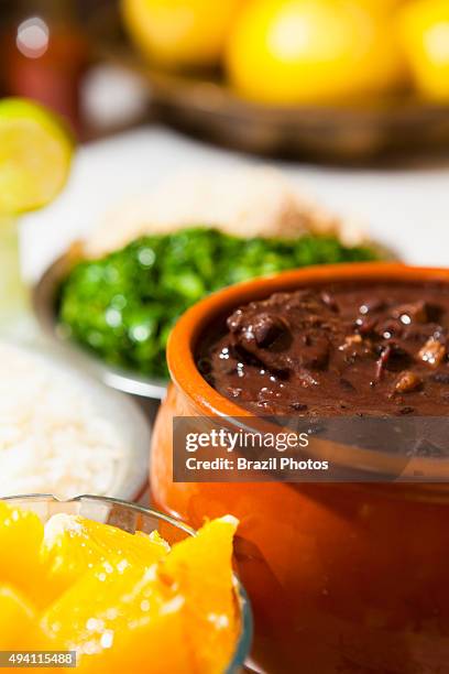 Feijoada at Bar do Mineiro, Santa Teresa district, Rio de Janeiro, Brazil - Feijoada is a stew of beans with beef and pork, which is a typical dish...