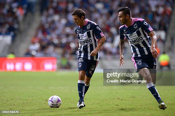 Neri Cardozo and Jesus Zavala of Monterrey in action during the 14th round match between Monterrey and Tijuana as part of the Apertura 2015 Liga MX...