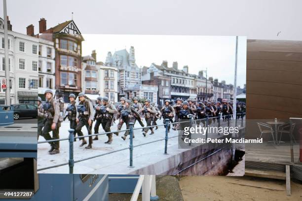 In this composite image a comparison has been made of Weymouth, England. D-Day took place on June 6, 1944. Image. US troops on the Esplanade at...