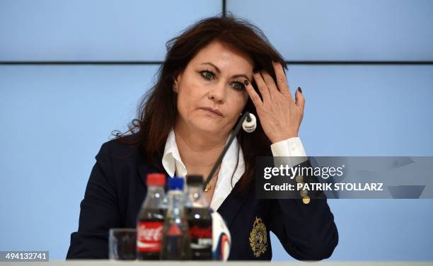 Claudia Merzbach, press officer of sportscommunication of German car manufacturer Mercedes Benz answers questions during a press conference of the...