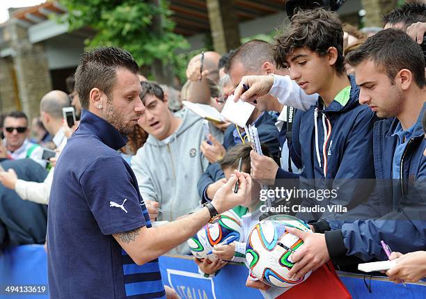 Antonio Cassano of Italy sign autographs for fan after a training session at Coverciano on May 28, 2014 in Florence, Italy.