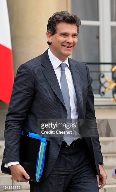 Arnaud Montebourg, Minister of Economy, Productive Recovery and Digital, leaves after a cabinet meeting at the Elysee Palace on May 28, 2014 in...