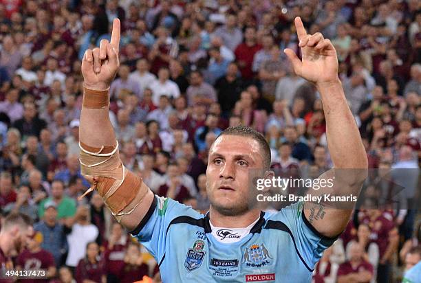 Robbie Farah of the Blues celebrates victory after game one of the State of Origin series between the Queensland Maroons and the New South Wales...