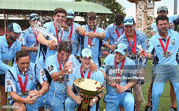 New South Wales celebrate with the trophy after the Matador BBQs One Day Cup final match between New South Wales and South Australia at North Sydney...