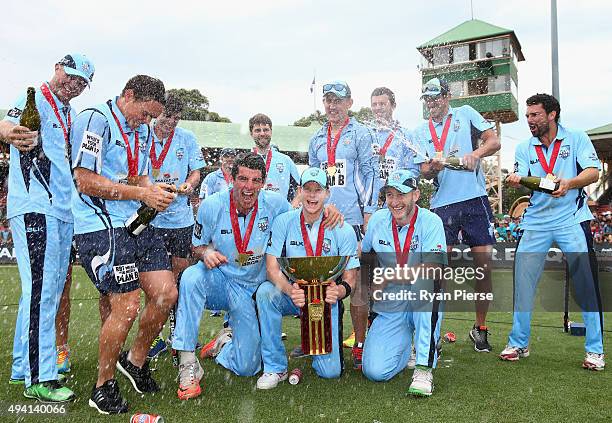 New South Wales celebrate with the trophy after the Matador BBQs One Day Cup final match between New South Wales and South Australia at North Sydney...