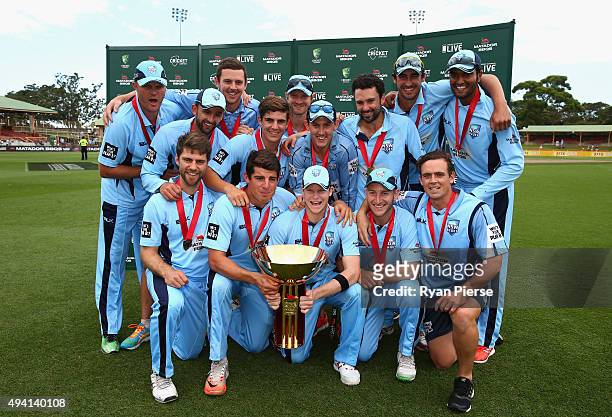 New South Wales celebrate with the trophy after the Matador BBQs One Day Cup final match between New South Wales and South Australia at North Sydney...